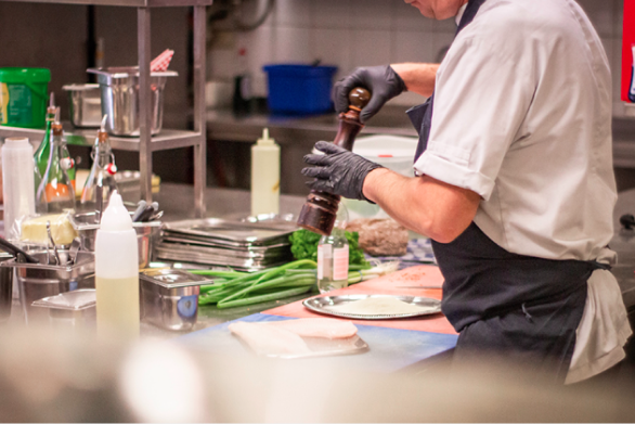 Our chef preparing meals in the kitchen
