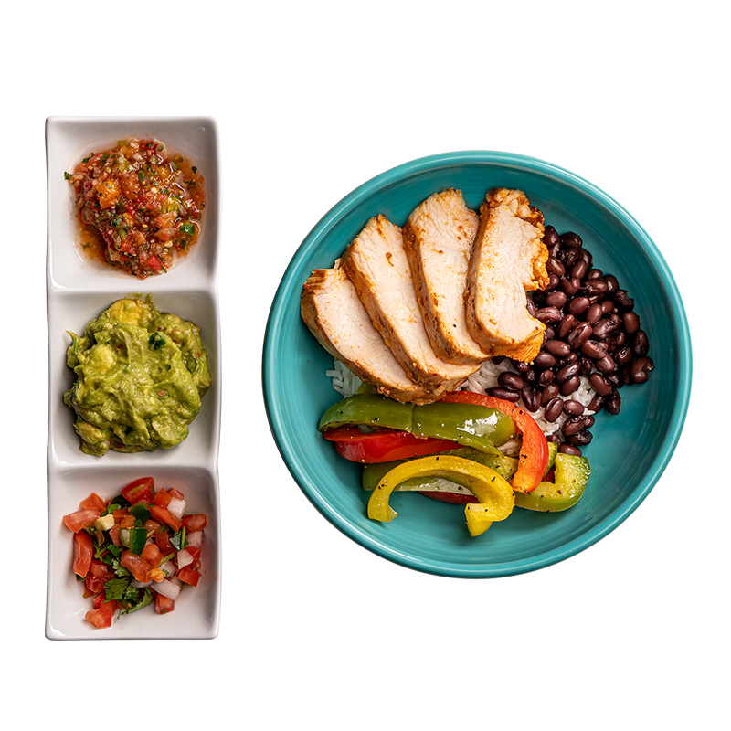 Burrito bowl side plate containing salsa, guac, and pico de gallo from All in Meals